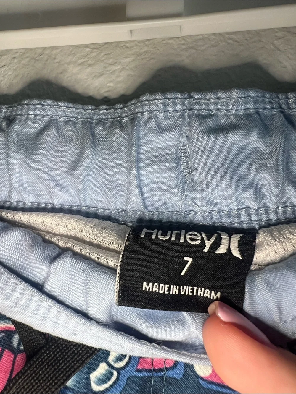 Hurley Navy Swim Shorts with Pink and White Surf Graphics